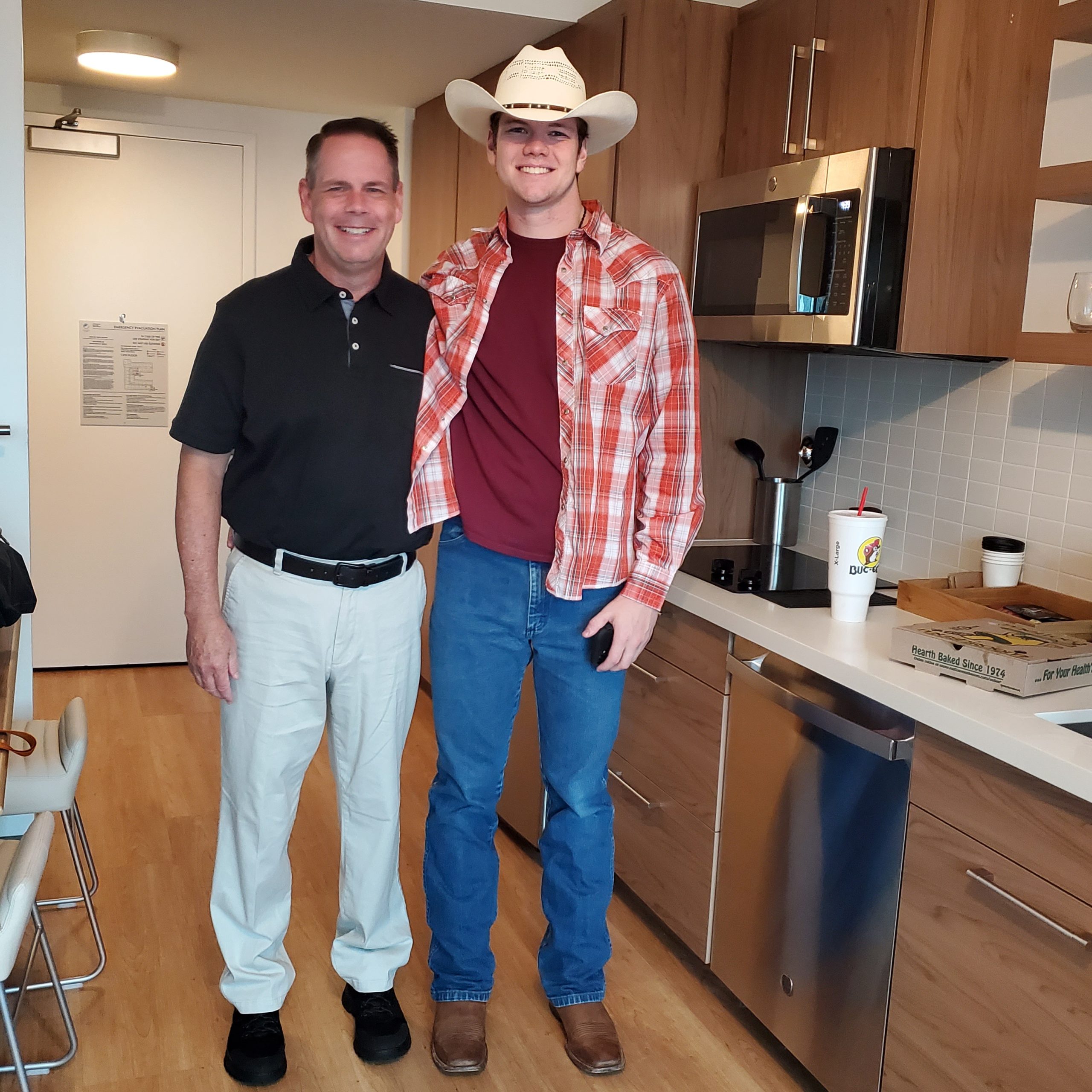 Father and son on their way to a music concert in Atlanta, Georgia to see Luke Combs.
