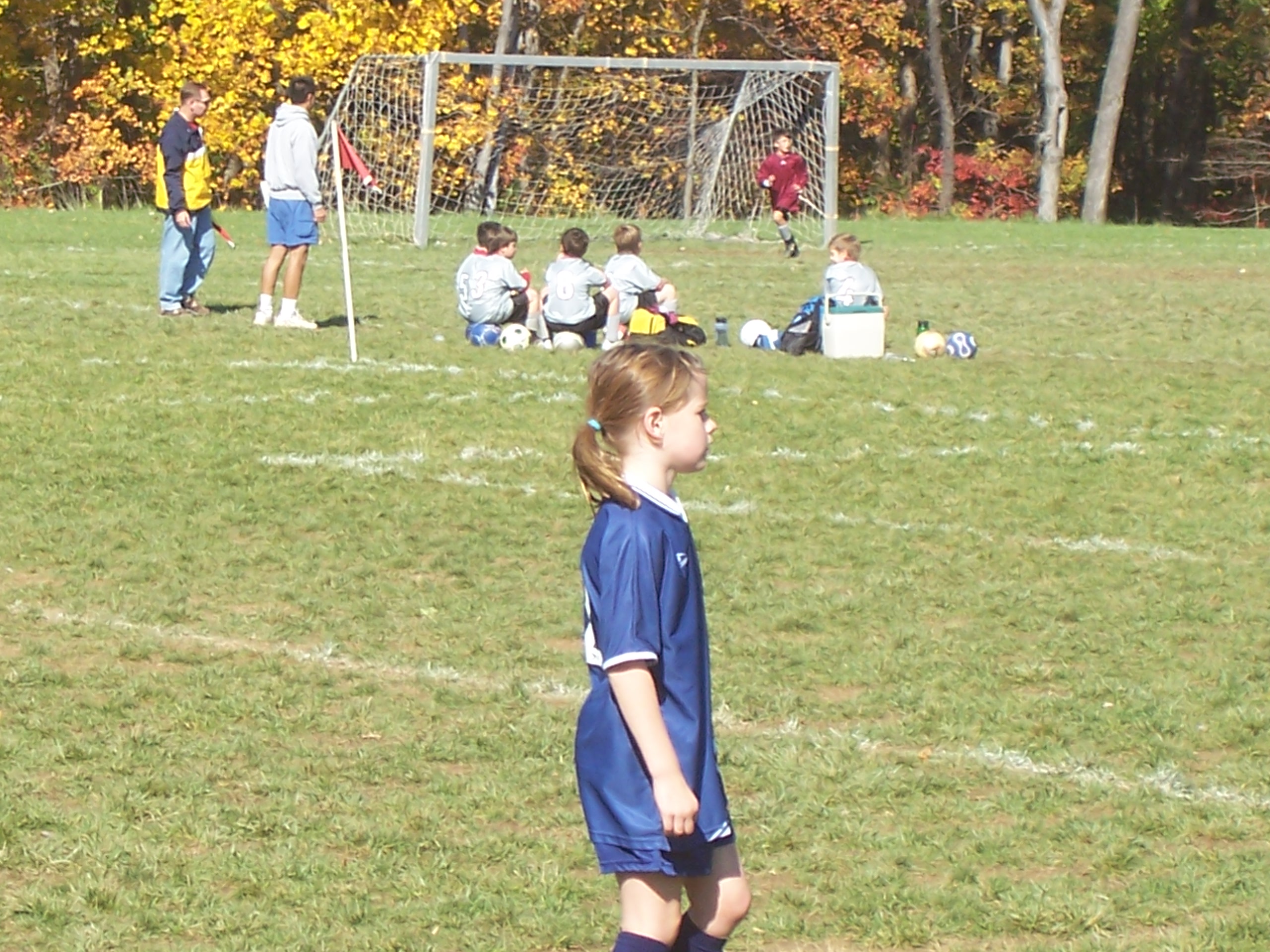 Kid playing a soccer game
